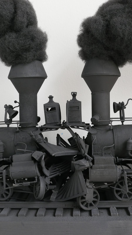 sculpture, conceptual art, model train, train crash, miniature, crash at crush, black smoke, head on collision, train art, political art, spectacle art